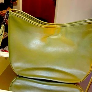 A Coach large strap pocketbook, A beautiful wilderness green ,a lot of space